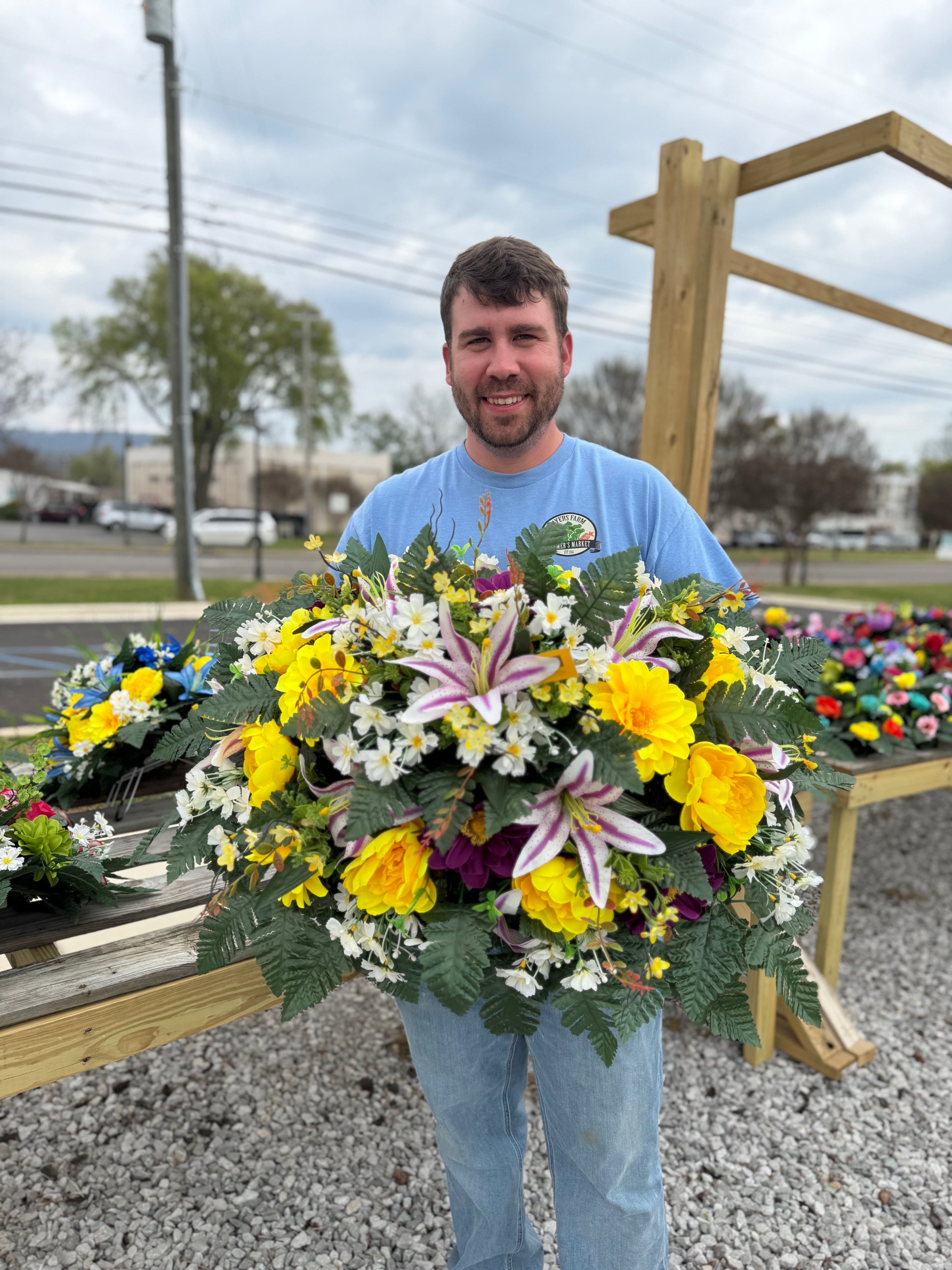 Cemetery Arrangements - Large Saddle (White & Purple Lilly/ Yellow Gerber)